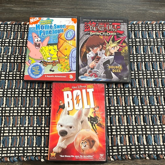 🌟SALE! 3 for $14!!🌟 Set of 3 DVDs Bolt, SpongeBob, and Yu-Gi-Oh. - Picture 1 of 3